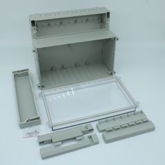 Двухсекционный корпус IP65 с откидной прозрачной крышкой, база ABS светло-серая, крышка из поликарбоната