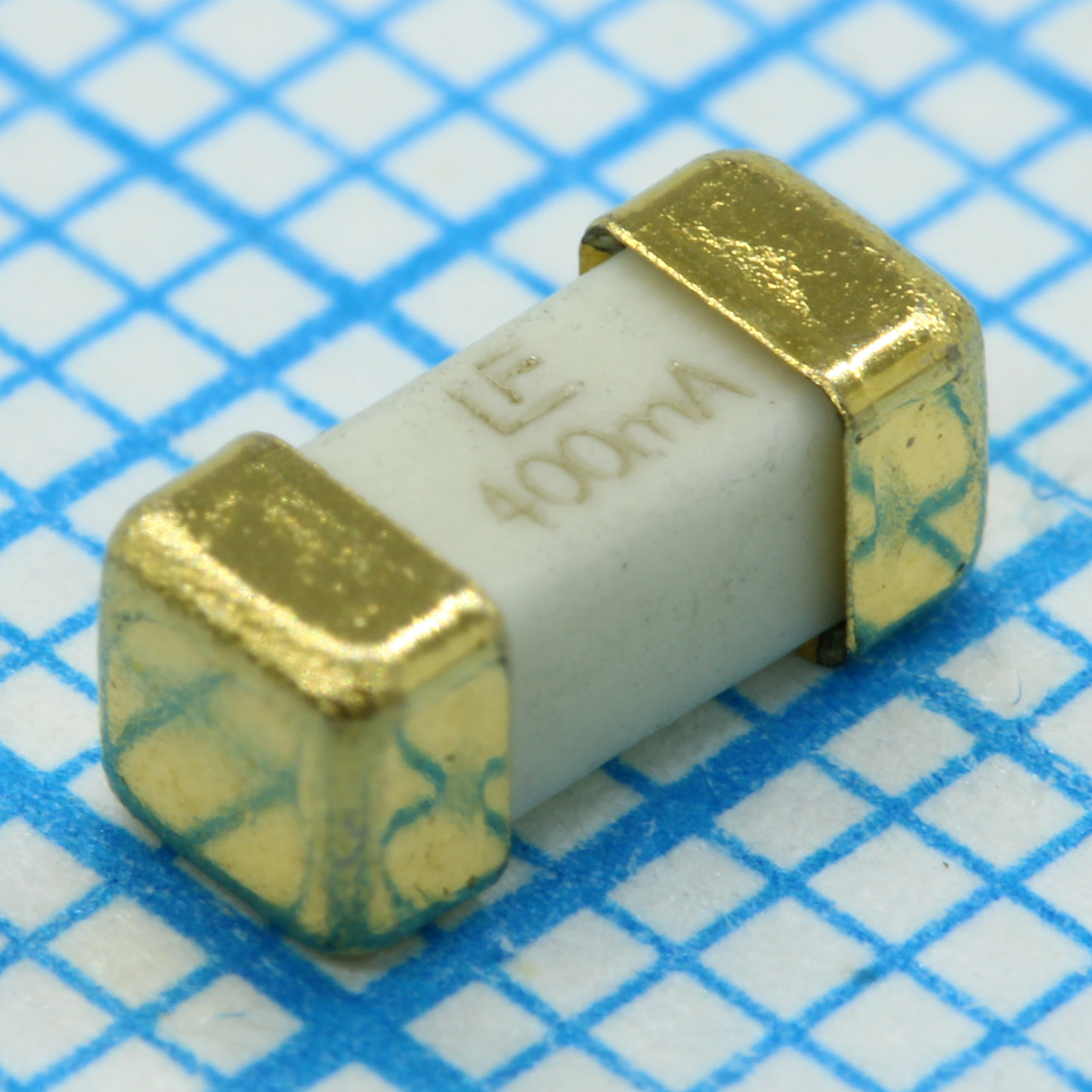 Предохранитель сверхбыстродействующий 0.4A 125В SMD 2410 керамический лента на катушке