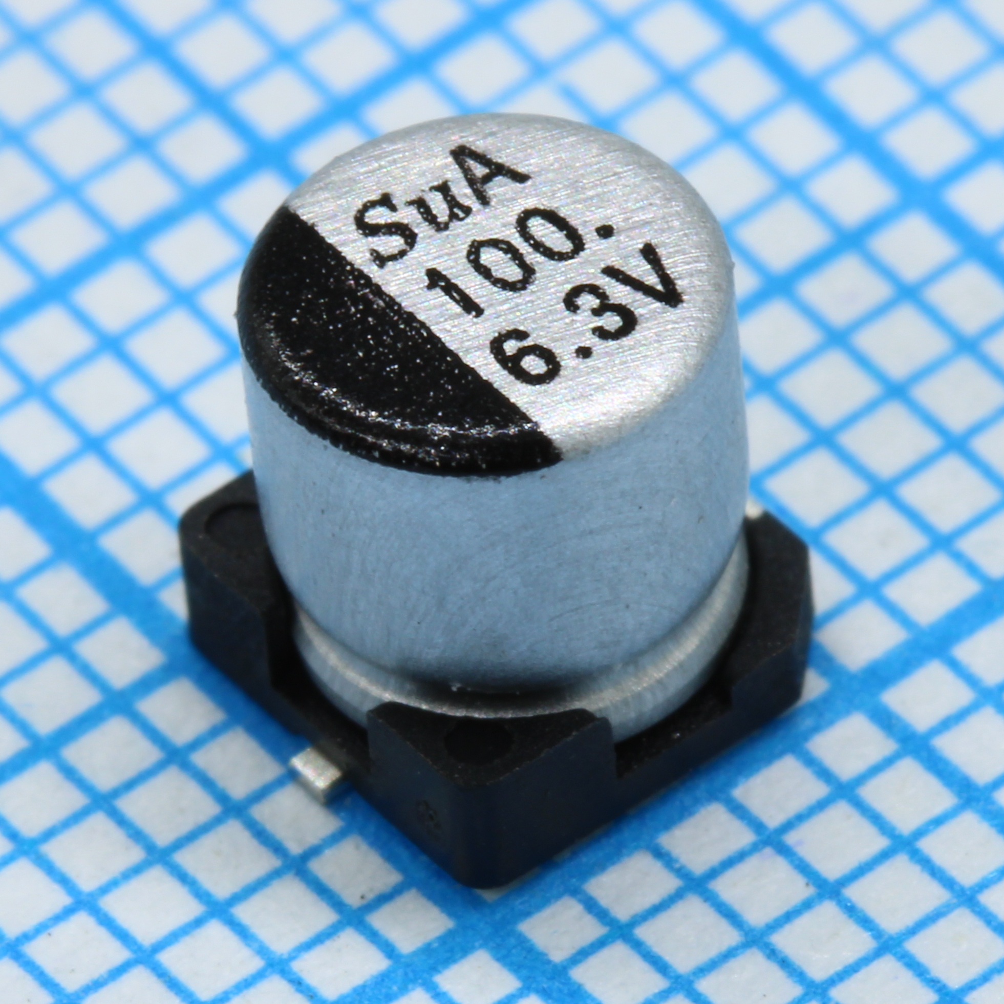 SMD Конденсатор алюминиевый электролитический 6.3В, 100мкФ ±20%, размер 5 X 5.8мм, 0.8 Ом, 150мА, 2000ч, 105С