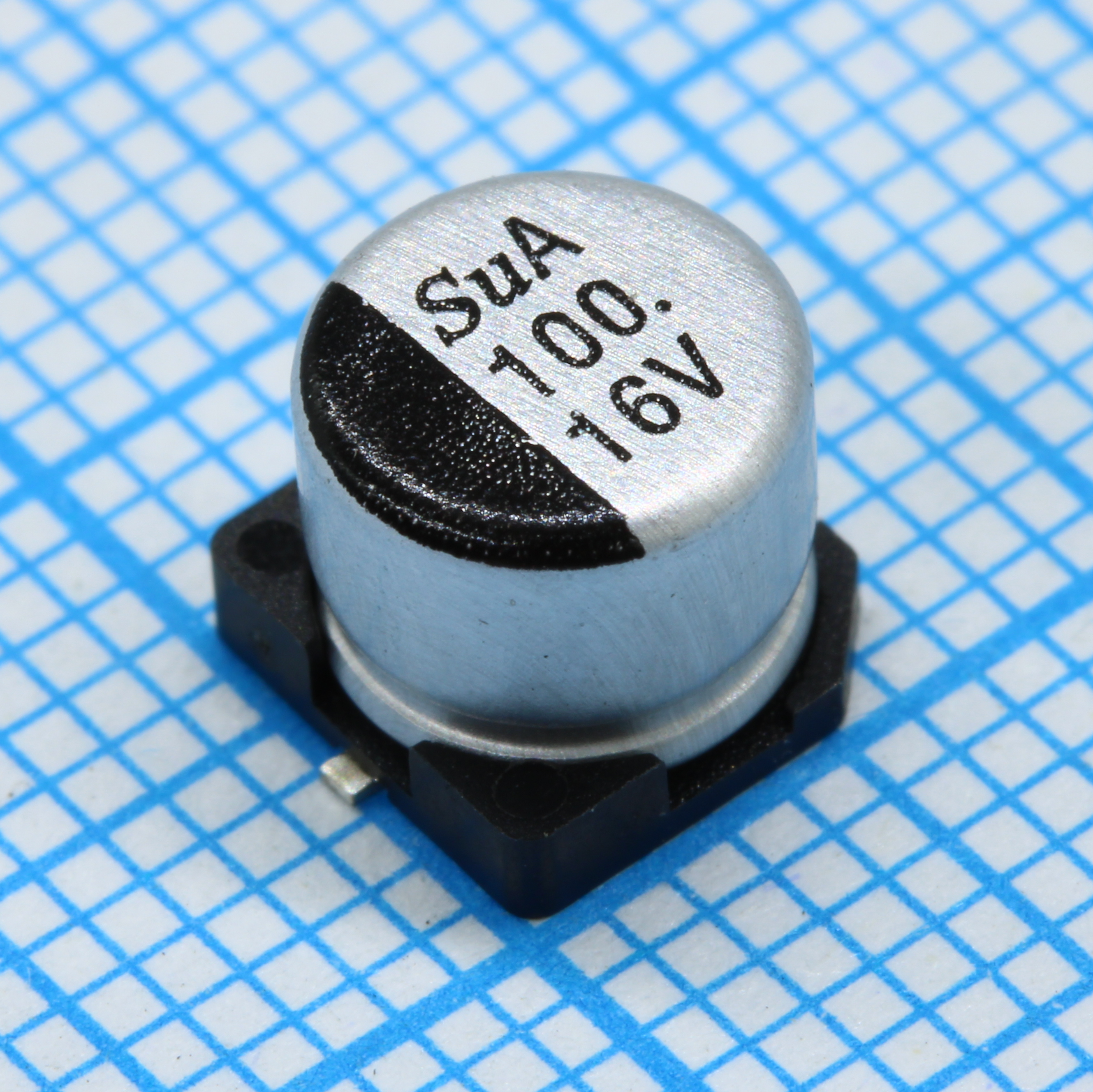 SMD Конденсатор алюминиевый электролитический 16В, 100мкФ ±20%, размер 6.3 X 5.8мм, 0.44 Ом, 230мА, 2000ч, 105С